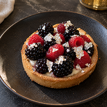 Berry tart dusted with silver
